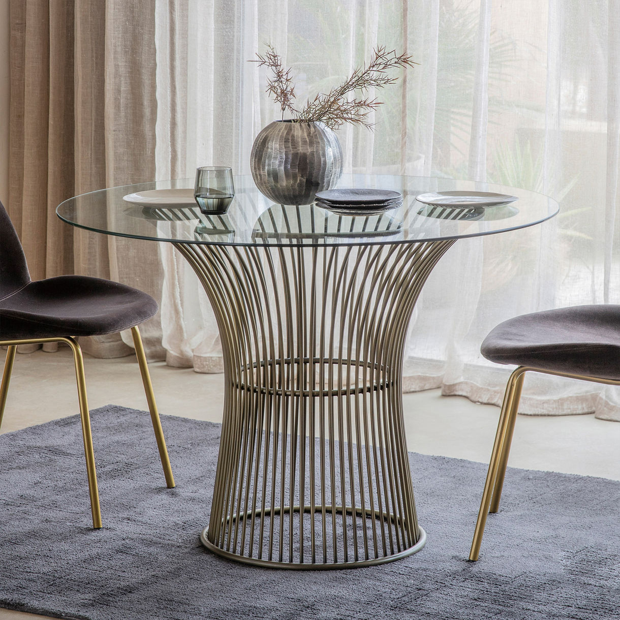 Terning Glass Round Dining Table In Gold Finish